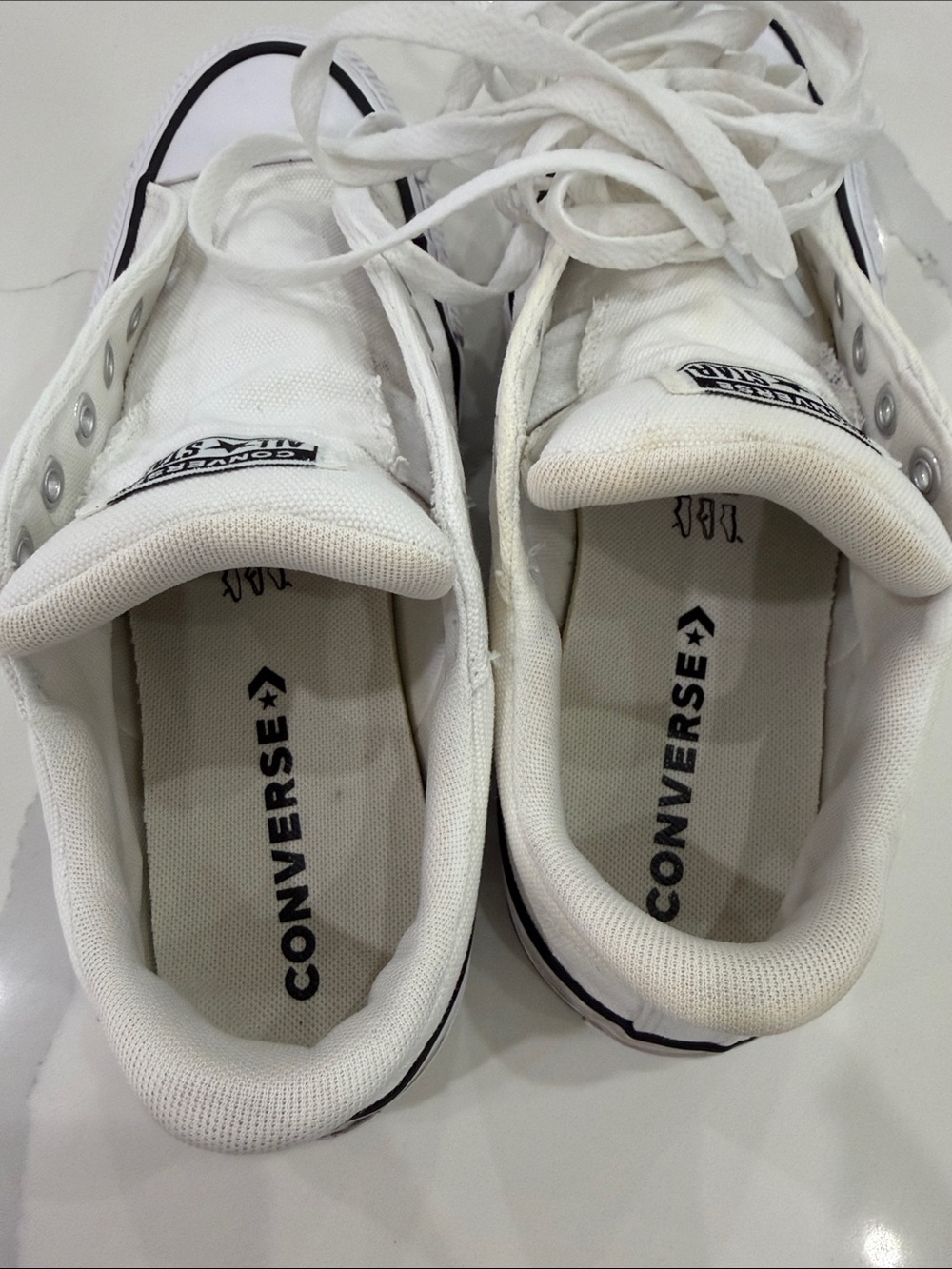 Converse White Low-Top Slip-On Canvas Sneakers with Black Trim - Picture 7 of 10
